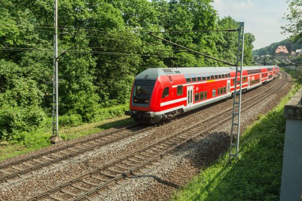 Red train is on the track in Saxony.